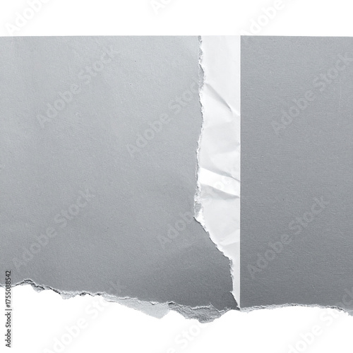 Torn gray paper revealing white folded section, against black background. Detailed, texture visible