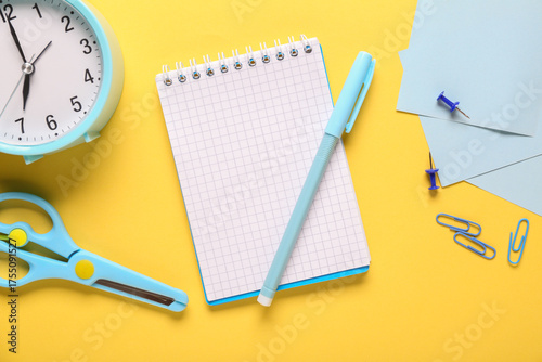Notebook with pen, paper cl...