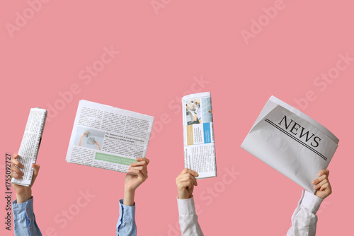 Female hands with newspaper...