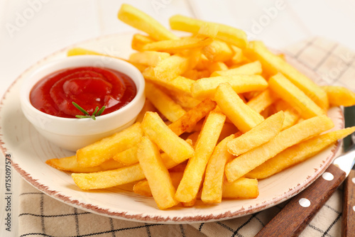 Plate with tasty french fri...