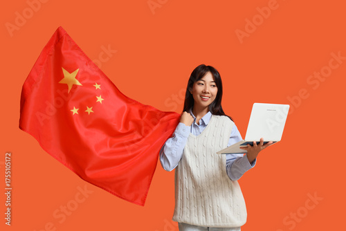 Young Asian woman with flag...