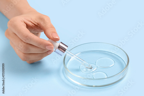 Scientist working with pipe...