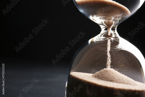 Hourglass with beige crysta...