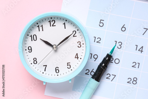 Calendar with alarm clock a...