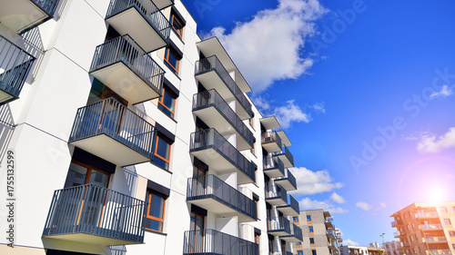 New modern block of flat, condo architecture. Residential apartment flat, luxury house complex. City real estate property.