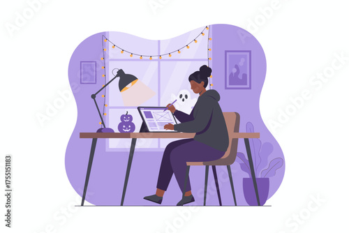 Woman designing on a tablet in a cozy Halloweenthemed home office Creative remote work