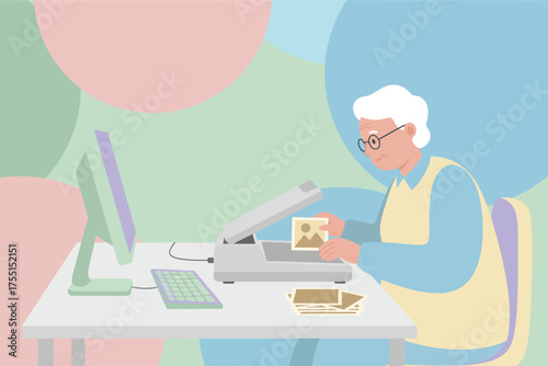 Elderly person scanning old photographs at a desk with a computer preserving memories