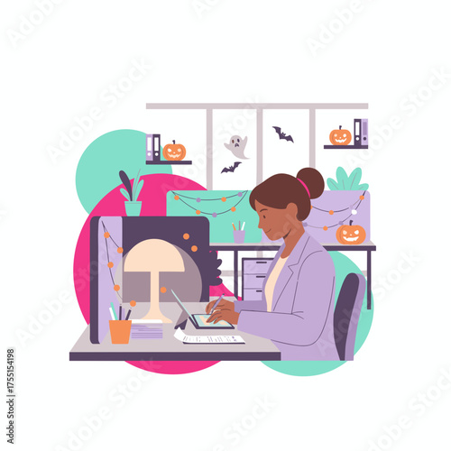 Smiling woman working at a festive Halloweendecorated office desk balancing work and holiday spirit