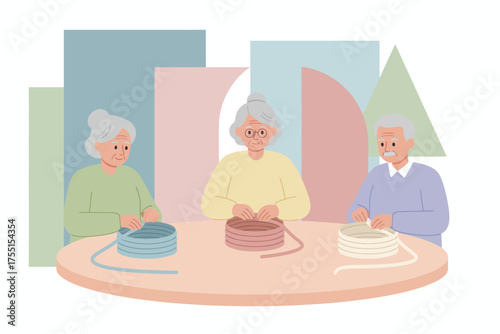 Joyful elderly people crafting together focused on a creative hobby promoting community and wellbeing