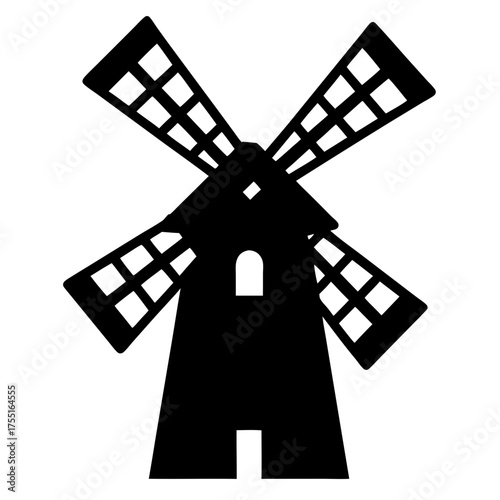 Silhouette of a traditional windmill with revolving sails for grinding grain