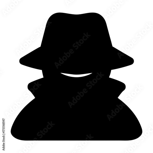 Mysterious silhouette of a person wearing a hat and coat or suit