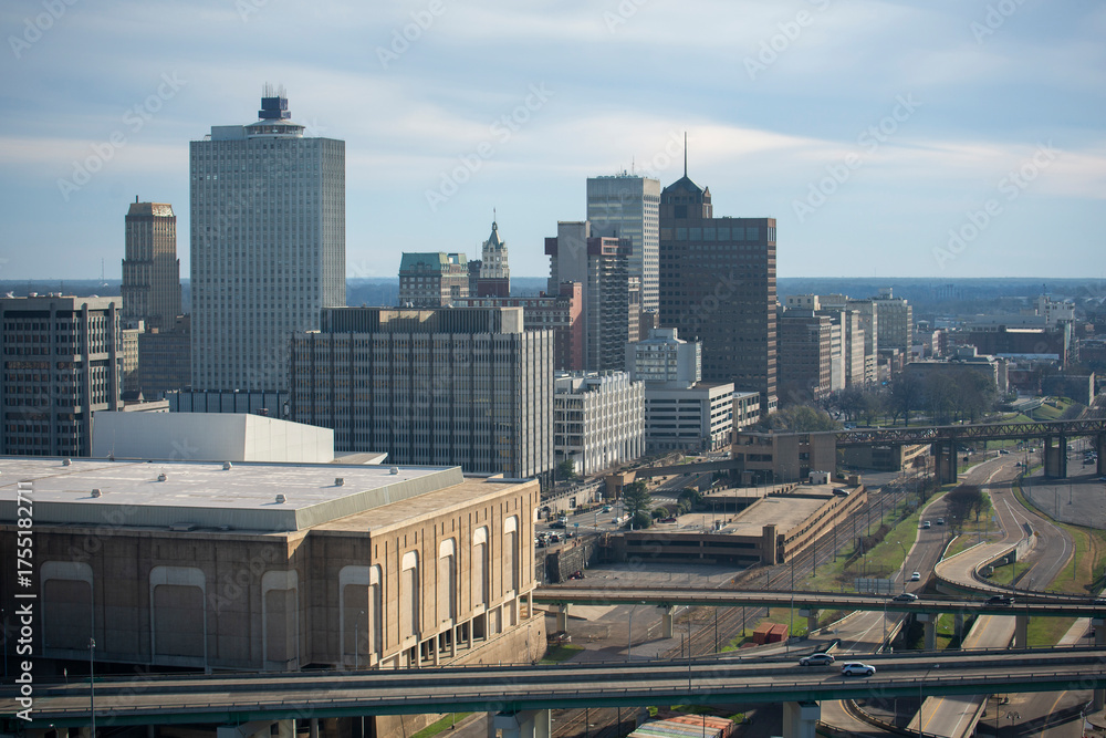Fototapeta premium Hazy afternoon winter sun shines on the buildings of downtown Memphis, Tennessee, USA.
