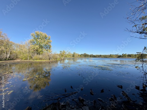 A lake against a blue sky