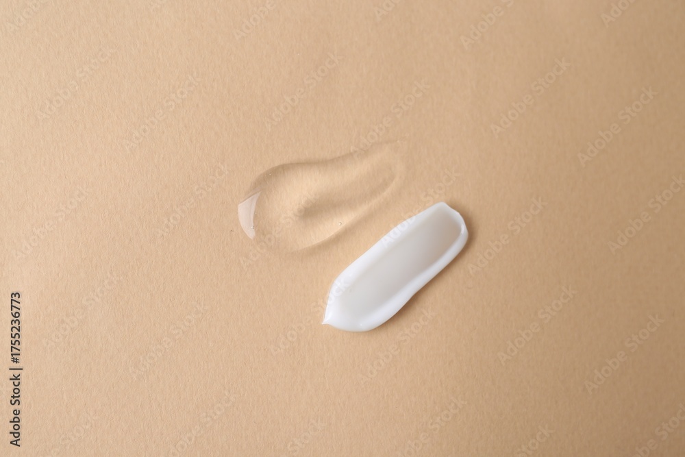 Obraz premium Samples of cosmetic products on beige background, top view