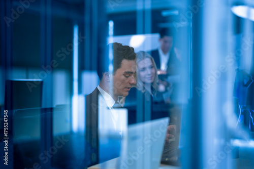 Canvastavla In a futuristic high-security office, a corporate intelligence analyst conducts a covert digital forensics investigation, tracking the source of a sophisticated industrial espionage attempt