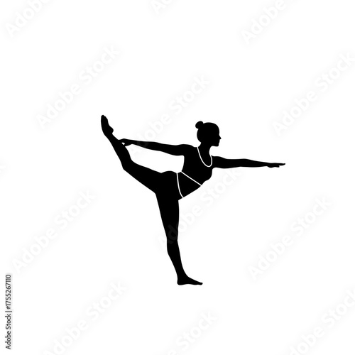 Elegant silhouette of a woman performing a graceful yoga pose dancer pose of balance and strength