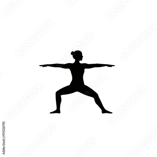 Silhouette of a woman performing warrior ii yoga pose for fitness and wellness