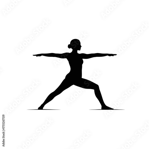 Silhouette of a woman performing yoga warrior ii pose embodying strength and balance