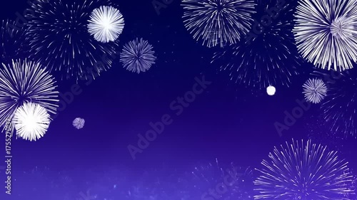 A festive display of fireworks exploding against a deep purple background.