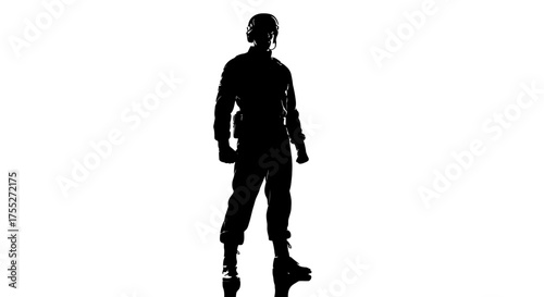 Silhouette of a soldier standing in full uniform with helmet and gear.