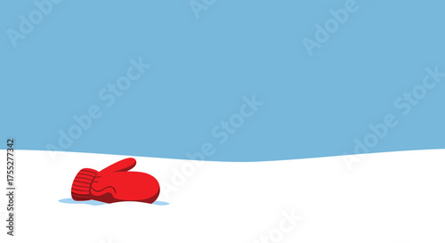 Red mitten lies alone on snowy hill under a bright blue sky, evoking a sense of winter solitude and loss.