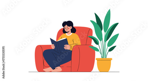 A person is reading a book on a comfortable chair next to a large green plant.