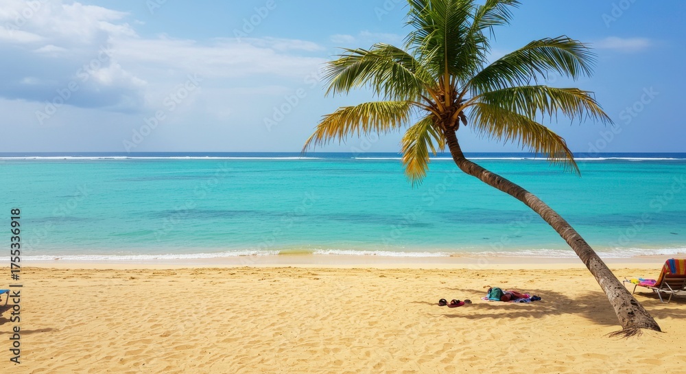 Obraz premium Idyllic tropical beach with a leaning palm tree perfect for relaxation and vacation vibes