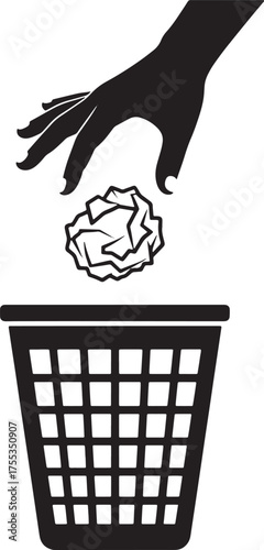 Hand Discarding Crumpled Paper into Wastebasket - A Symbol of Disposal.