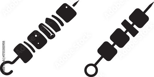 Two skewers of grilled meat and vegetables silhouette