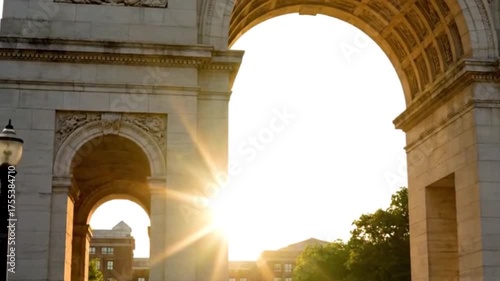 Sunlight streaming through the Washington Square Arch in New York City.