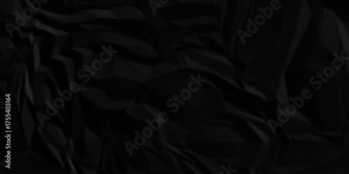 Black paper wrinkled texture for background space. Rough black paper. Paper texture, recycled creased paper background.	
