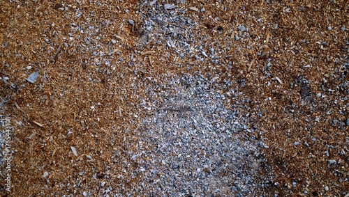 Rough brown gravel texture close-up outdoor surface