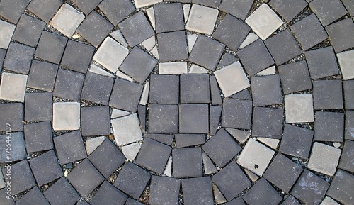 Gray cobblestone pavement texture pattern top view