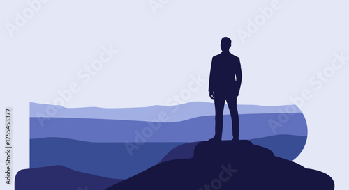 Businessman silhouette standing on a mountain peak.