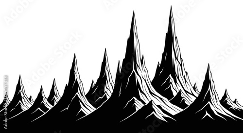 Dramatic black and white jagged mountain peaks in a stark landscape