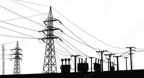 High voltage electricity substation with power transmission towers and utility poles