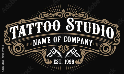 Vintage tattoo studio emblem design featuring ornate typography, twin tattoo machines, elegant floral flourishes, and bold classic lettering on black background