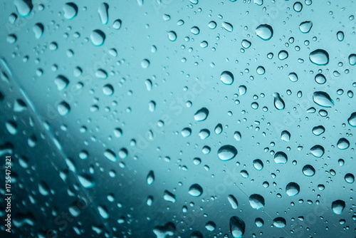 Raindrops on Glass with Blue Light – Abstract Texture Background