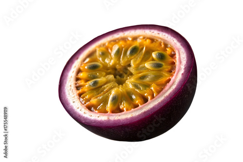 Half of a ripe purple passion fruit showing the vibrant yellow pulp and seeds under dramatic lighting isolated on transparent background
