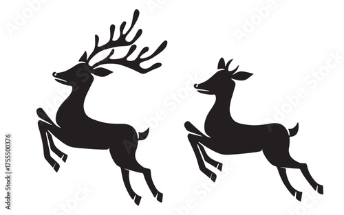 silhouette of a pair of deer