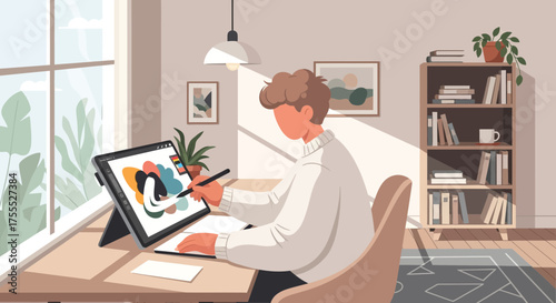 Illustrative digital artist creating artwork with pen tablet in a cozy home studio scene