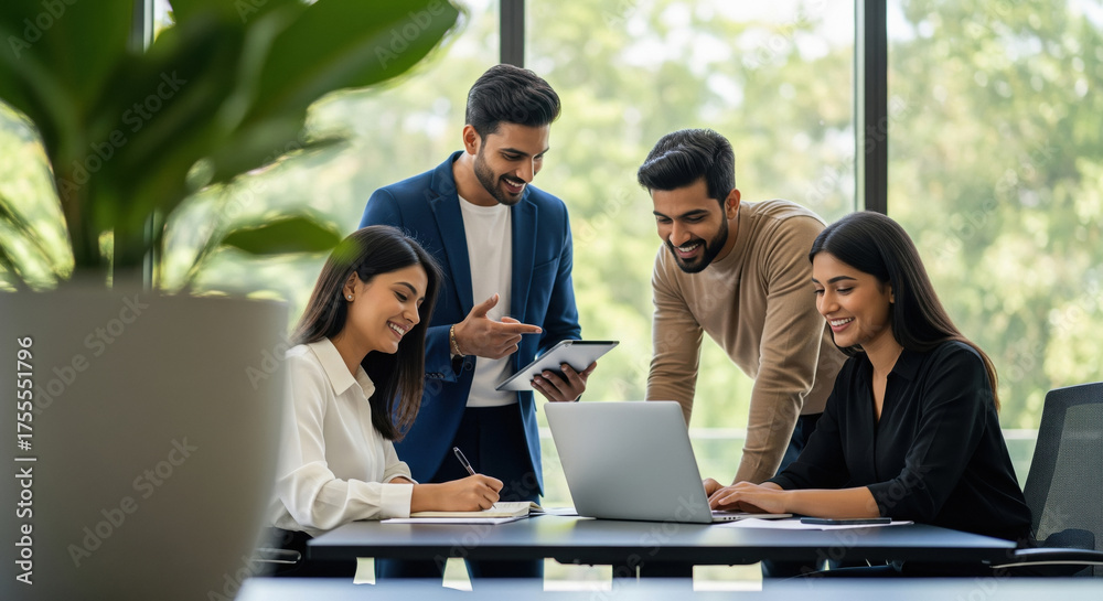Obraz premium Young Indian Business Team Collaborating in a Modern Office