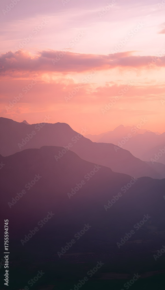 Obraz premium Majestic mountain sunset a breathtaking panorama of vibrant pink orange hues and serene peaceful atmosphere