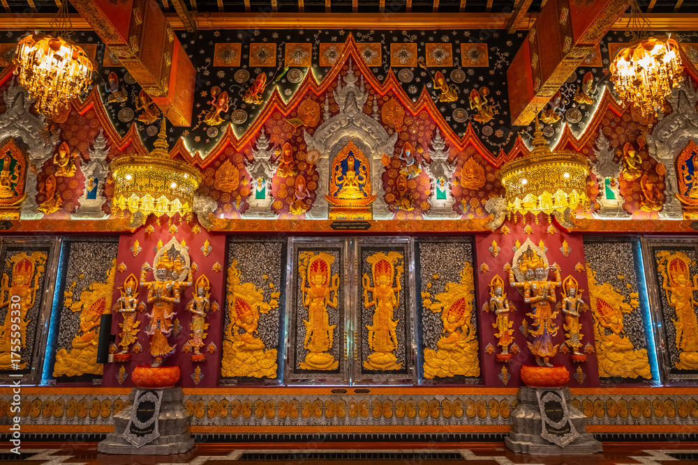 Fototapeta premium Wat Si Don Mun in Chiang Mai, Thailand, shines with golden details and elegant Lanna architecture, reflecting the beauty and spiritual charm of Northern Thai culture.