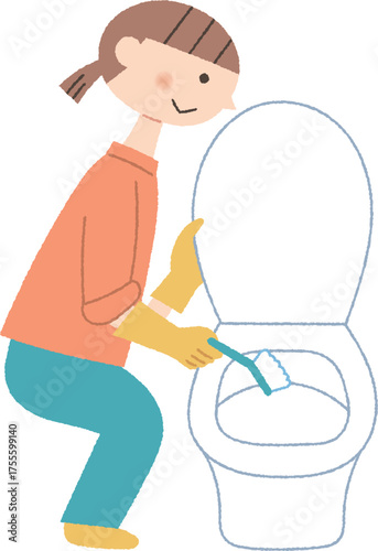 トイレをブラシで磨く女性