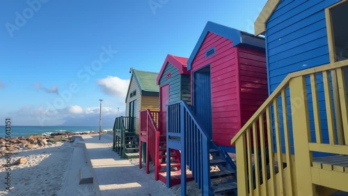 Colourful beach huts of St James beach in Cape Town, South Africa.