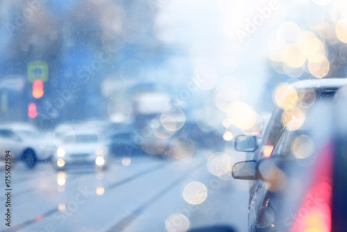 Autumn on a city highway, blurred background, traffic in gloomy weather, cars, cloudy day