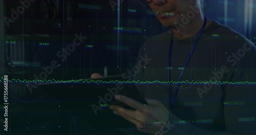 Monitoring data overlays, Korean IT tech with lanyard tapping tablet among server racks, copy space