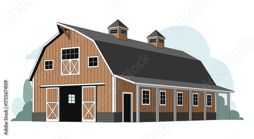 A classic American barn with a pitched roof and multiple cupolas sits on a field.