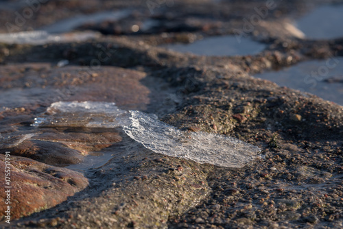 WINTER ON THE SEA COAST - Seawater and ice on the shoreline